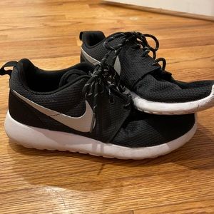 Black Nike running shoes